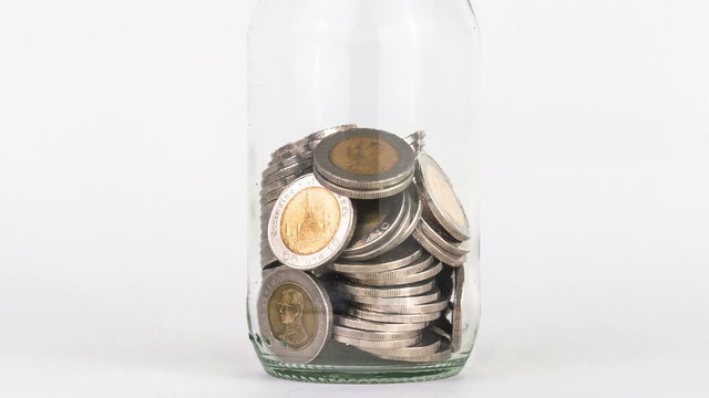 Timelape Saving  money coin  isolated on white background