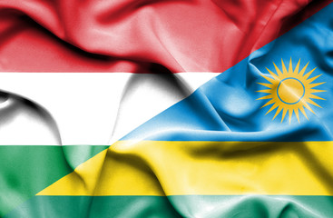 Waving flag of Rwanda and Hungary