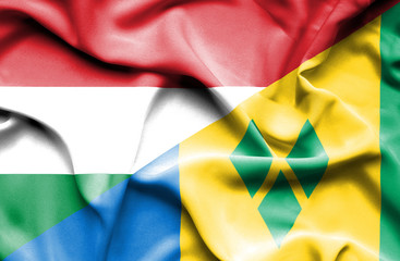 Waving flag of Saint Vincent and Grenadines and Hungary