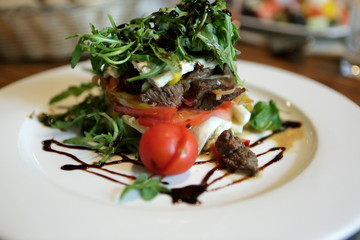 Salad with vegetables and veal