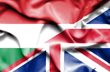 Waving flag of United Kingdom and Hungary