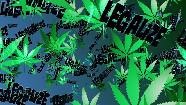 Flying cannabis leaves with message "Legalize"