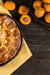 Homemade apricot tart with almonds and fresh fruits