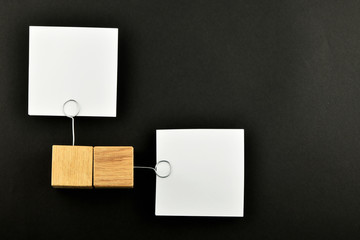 Opposite Opinion, Two paper notes on black background presentation