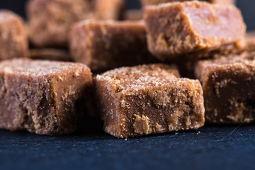 Traditional homemade fudge toffee, cut in squares cubes