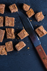 Traditional homemade fudge toffee, cut in squares cubes