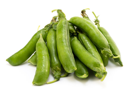 Pile of pea pods isolated on white
