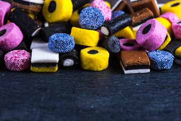 Liquorice candy vibrant background