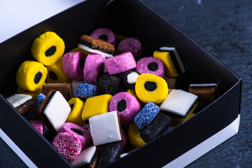 Liquorice candy vibrant background