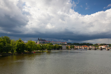 Fototapeta na wymiar View on the Prague gothic Castle and Old Town before heavy storm