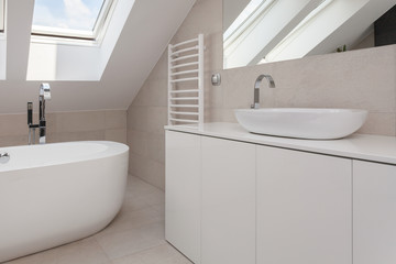 Beige and white bathroom interior