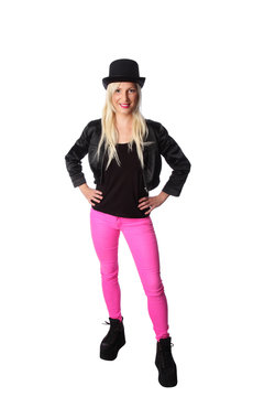 Attractive woman wearing a black jacket, pink pants and a top hat