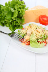 Caesar salad in a white plate