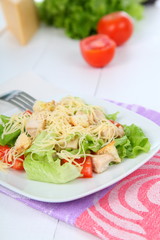 Caesar salad in a white plate