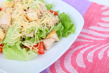 Caesar salad in a white plate