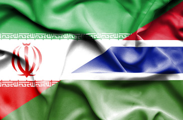 Waving flag of Gambia and Iran.