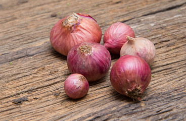 Fototapeta premium shallots on wood.