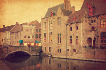 Fototapeta na wymiar Bruges historic centre, Belgium. Photo in retro style. Paper texture.