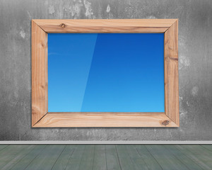Wooden frame window with view of blue sky