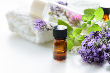 essential oils with natural cosmetics and herbs