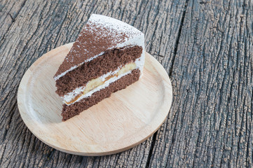 banana cake, Slice banana cake on wood plate, banoffee, cake.