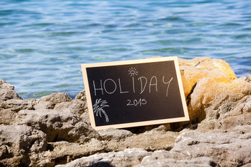 Blackboard with holiday text
