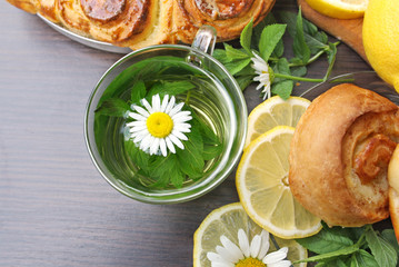 a Cup of green tea and delicious buns