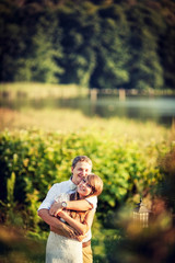 Fototapeta premium newlyweds hugging on nature