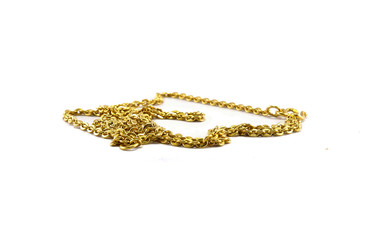 Gold chain jewely focusing at the front and blurred in depth isolated on white background