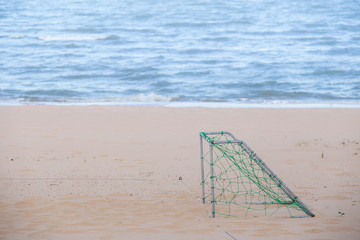 Fototapeta premium soccer goal on the white sand beach at Island,Thailand