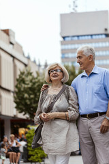 Naklejka premium Mature Couple On Promenade