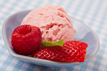 Strawberry and raspberry with ice cream scoop