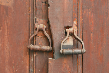Door knocker on the old gate