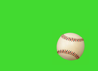 Baseball on green background.