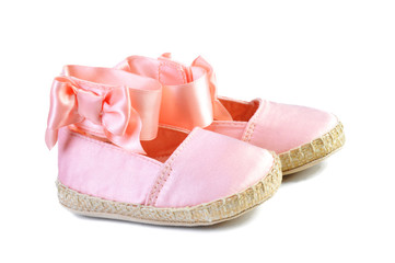 pink balerina shoe close-up isolated on white