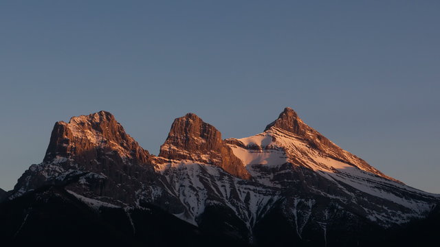 4K Time lapse close up 3 Sisters Mountains sunset Canmore
