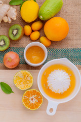 Freshly orange juice with orange slice, ginger , passion fruit ,