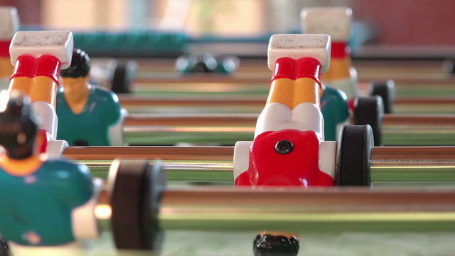 Table Soccer, Blue and Red Players in Football Kicker Game, Selective Focus, Retro Cinematic Tone Effect