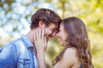 Fototapeta premium Hipster couple smiling at each other 
