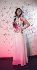 Fototapeta premium Girl surrounded by butterflies