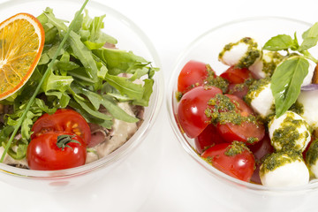 tomatoes and cheese on white plate in a restaurant