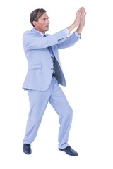 Businessman walking while gesturing with hands