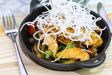 Chicken in sweet curry sauce with spaghetti