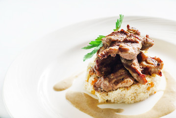  meat served with  millet