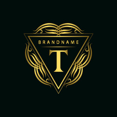 Monogram design elements, graceful template. Calligraphic elegant line art logo design. Gold emblem, T. Business sign for Royalty, Boutique, Cafe, Hotel, Heraldic, Jewelry, Wine. Vector illustration