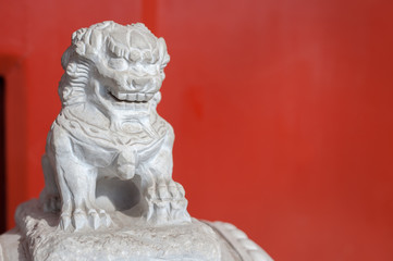 Obraz premium White marble figure outside a residential building, Beijing, China