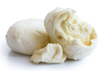 Torn ball of mozzarella cheese isolated on white.