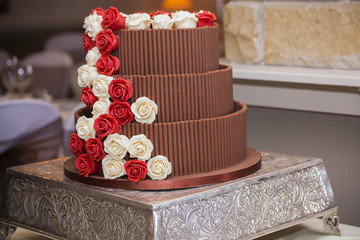 Chocolate wedding cake with roses