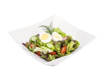 Garden Salad with an Pickled Egg on Top Isolated on White