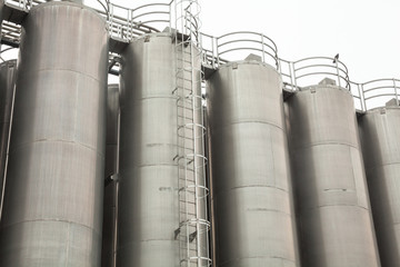 Metal tower silos of the industrial plant